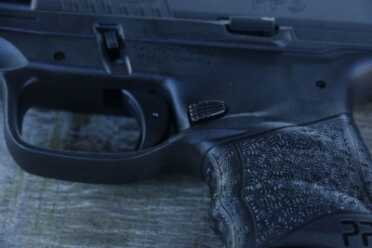 We Shoot the New Walther PPS M2--New Gun Review The magazine release is strategically placed within the new ergonomic grip to avoid accidental activation.