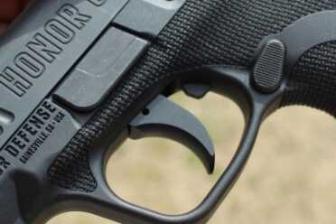 Honor Guard 9mm--Full Review The texture wraps the frame and extends above the trigger guard.