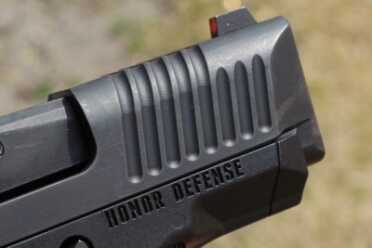 Honor Guard 9mm--Full Review Front slide serrations wrap all the way over the top.