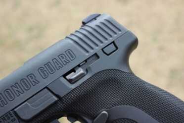 Honor Guard 9mm--Full Review That odd cut-out is where a safety lever would go. That is a plug of sorts.
