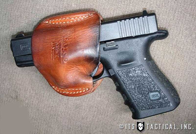 Check out how the leather has deformed and is now leaning in on the trigger. 