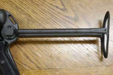 The Legacy of the MP40--Full Auto Review Rear of wire stock folds to store under weapon.