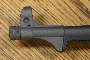 The Legacy of the MP40--Full Auto Review Barrel nut with hooded sight can screw on flip up cap or suppressor.