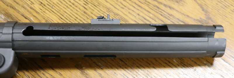 The Legacy of the MP40--Full Auto Review Upper receiver notches secure bold down or bolt open.