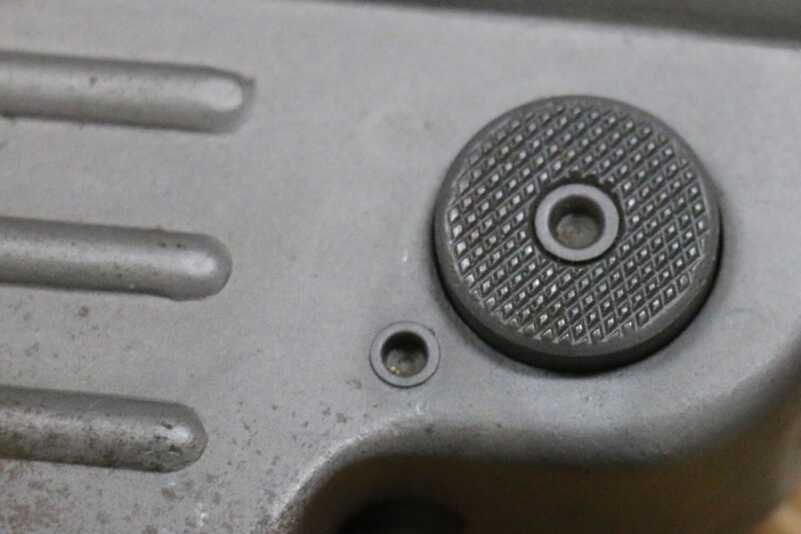 The Legacy of the MP40--Full Auto Review Magazine release knurled for gloved hands.