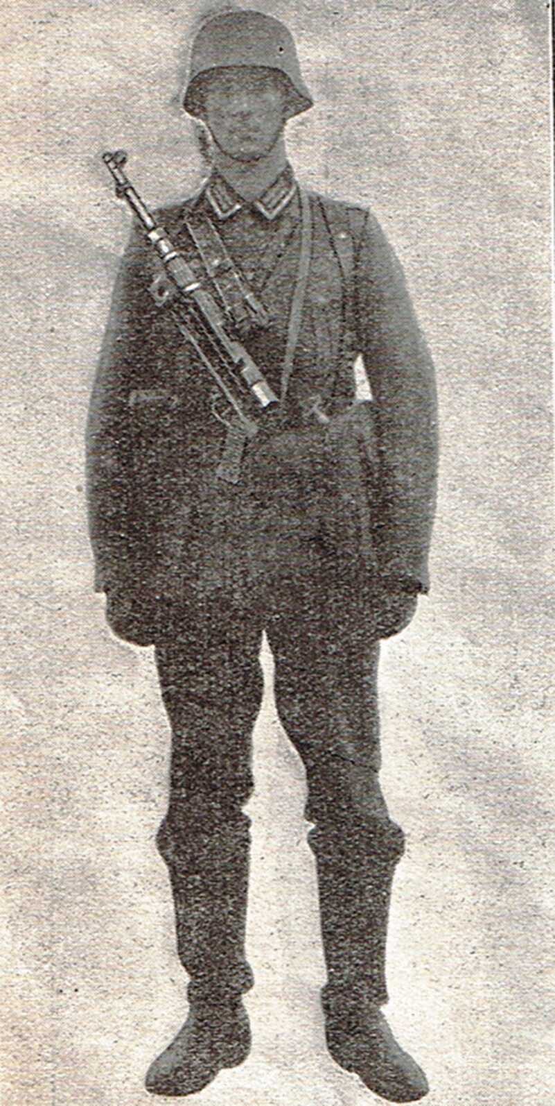 The Legacy of the MP40--Full Auto Review German infantry goon with MP40 slung.