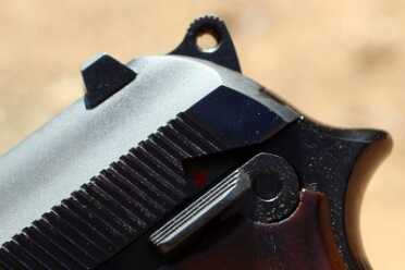 The Used Market: The Full Bodied .380 Taurus PT-58 The safety selector in the down/fire position.