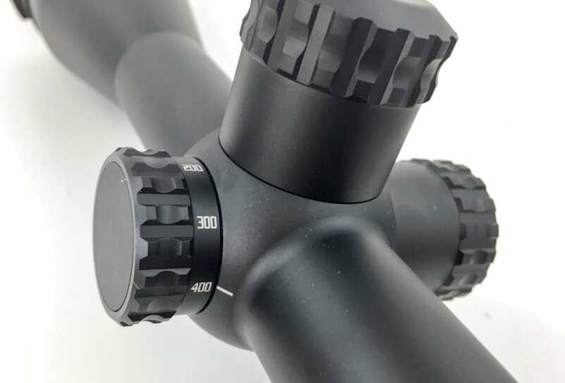 Optics Buying Guide: Iron Sights, Red Dots, and Scopes Scopes appropriate for shooting past a couple hundred yards generally have an adjustment to minimize parallax. This 3-20x Burris Veracity has a parallax adjustment dial on the left side that is set for a distance of 400 yards.