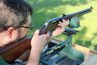 Testing out accuracy with iron sights at 100 yards tests your skills more than the gun's abilities. 