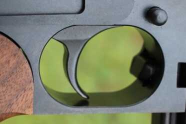The trigger is solid, and breaks at 4 pounds.