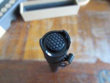 Factor LED Flashlights -- Review The rubber tailswitch. Easy to push!