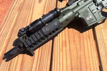 LWRC IC-PDW—5.56mm Close Quarters Combat System The short 8.5" barrel features an open-pronged muzzle device and is surrounded by a compact handguard.