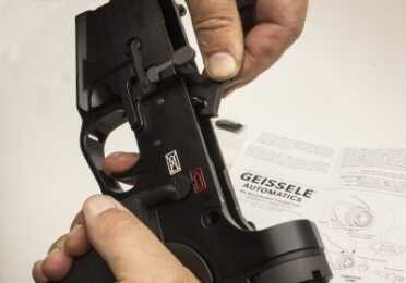 STEP 9: Check trigger reset: Set safety selector to FIRE. Dry fire weapon and keep trigger held back. Pull charging handle all the way back and release, letting the bolt carrier snap forward. The hammer should not fall. Release trigger. Hammer should be caught by the trigger.