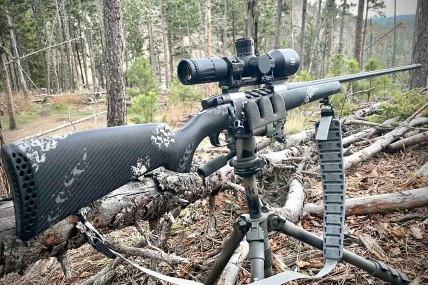 New From Weatherby: The Ultralight Mark V Backcountry 2.0 TI Weatherby Ultralight Mark V Backcountry 2.0 TI on tripod with trees