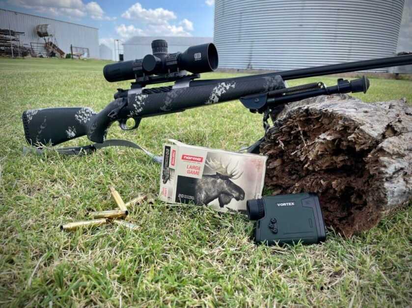 New From Weatherby: The Ultralight Mark V Backcountry 2.0 TI Weatherby Ultralight Mark V Backcountry 2.0 TI posed on a log