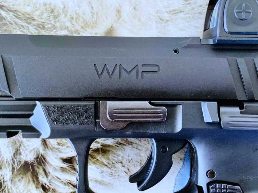 Walther WMP full-sized .22 WMR pistol showing its frame, slide, takedown lever, and accessory rail