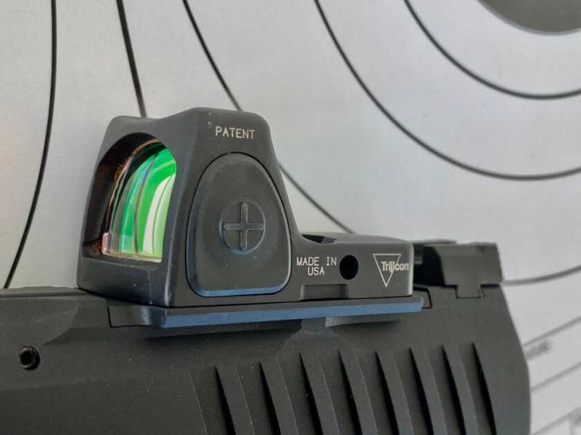 Walther WMP optics-ready .22 WMR pistol fitted with a Trijicon RMR red dot sight