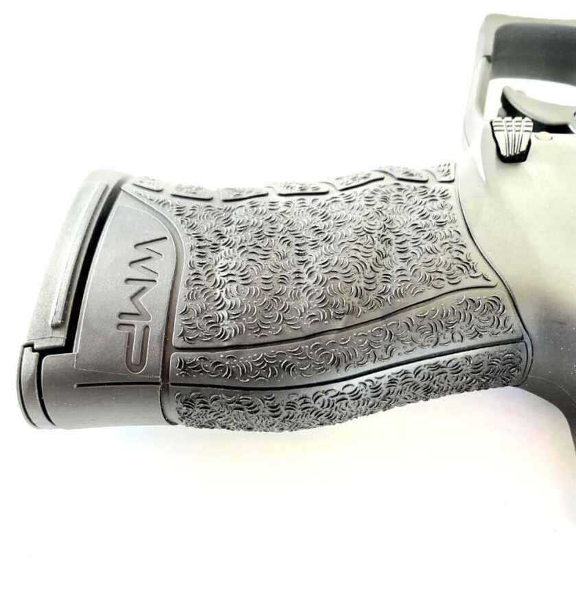 Close view of the Walther WMP polymer grip texture and ergonomic grip shape