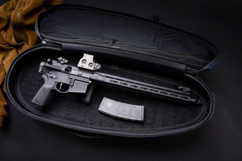 SAINT Victor with Law Tactical Folder in case.