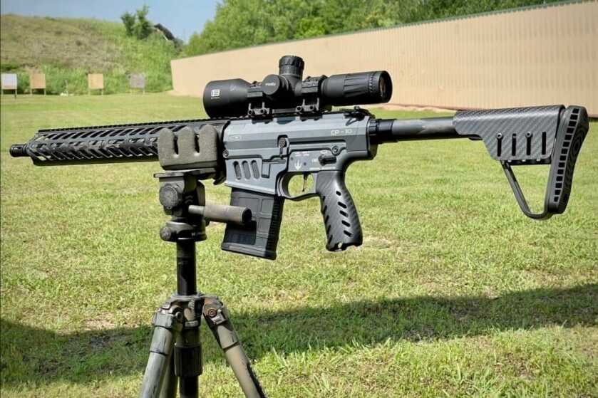 Meet the Ultralight Crown Precision Elite AR10 Crown Precision Elite fitted with factory carbon fiber furniture, topped with the Black Collar Arms Forged Carbon Fiber scope mount, and sitting in a carbon fiber Kopfjager K800 tripod