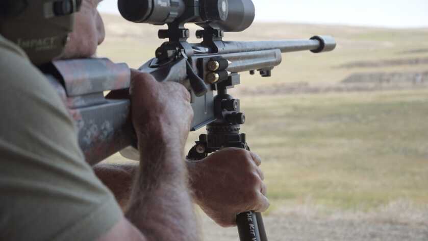 Never Miss Again Part III: Stabilize Your Rifle Hunter using a tripod to stabilize rifle