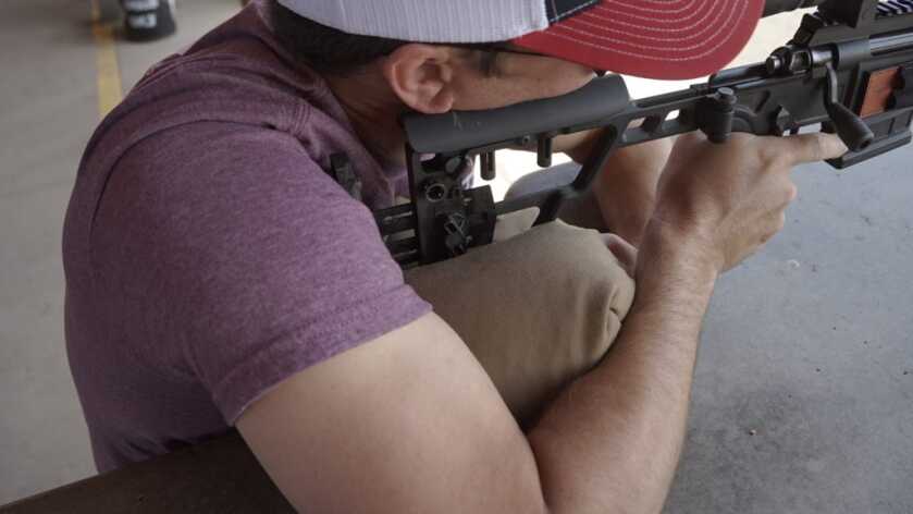 Never Miss Again Part III: Stabilize Your Rifle Hunter using shooting bag to stabilize rifle