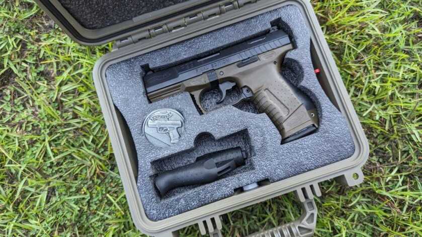 2 - The Walther P99 - Final Edition Walther's Final Edition and gear in case on the grass