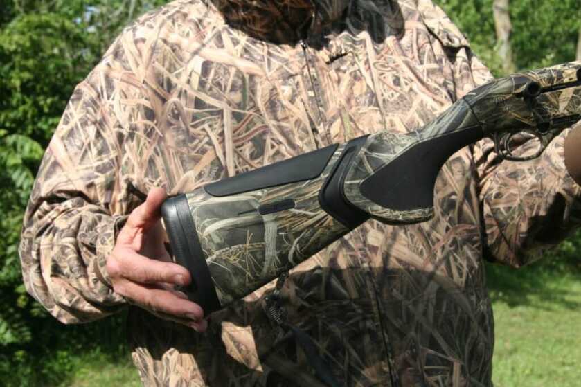 Down Gauging: The Beretta A-400 Extreme Plus Semi-Automatic 20-Gauge Hunter examining the buttstock of the Beretta A-400