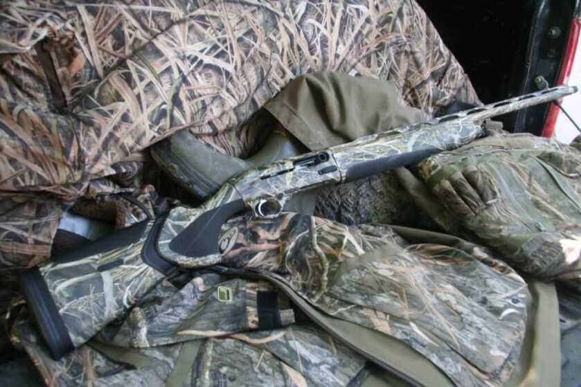 Down Gauging: The Beretta A-400 Extreme Plus Semi-Automatic 20-Gauge The Beretta A-400 against camo hunting gear