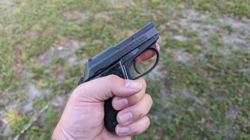 Small gun in person's hand