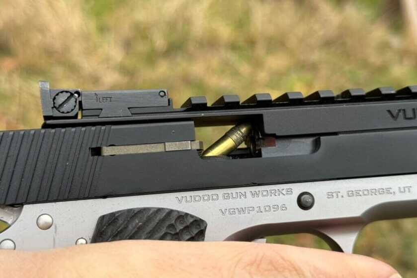Vudoo Gun Works Target 22LR 1911: Full Review Malfunction where the round is still in the magazine, yet jammed up into the rail above the barrel