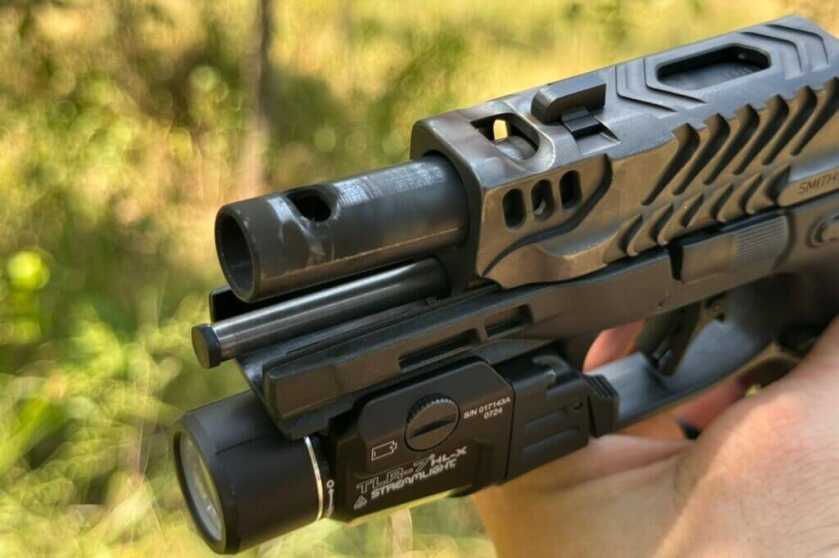 Closeup of Smith & Wesson handgun barrel outside