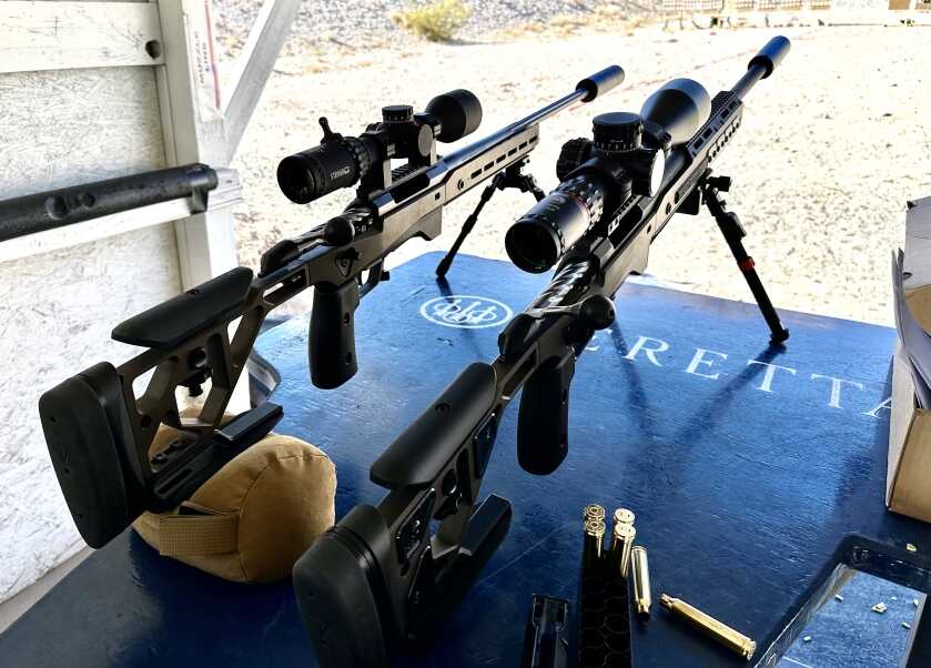 Two similiar rifles are shown next to eachother to highlight their differences.