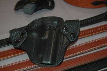 photo 4a The new sharkskin / leather combination holsters: open top, in both black and brown. Give your gun something classy to ride in.