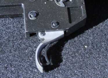 The trigger assembly on the American is adjustable from 3 to 5 pounds, and looks a lot like the safety trigger on the Savage. But this trigger is a completely new design from Ruger, and it locks the trigger, not the sear.