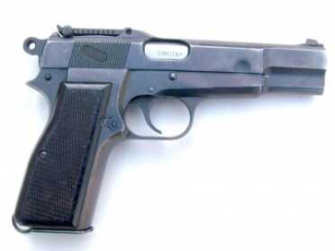 The Browning High Power - The Original and Classic Pistol The tangent sight marks this as a military contract High Power. It is among the more desirable models from a collector standpoint.