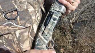 The Max-5 on the Mossberg next to Max-4 on a pair of waders. It is easy to see the greens on the Max-5 that the Max-4 doesn’t have. 