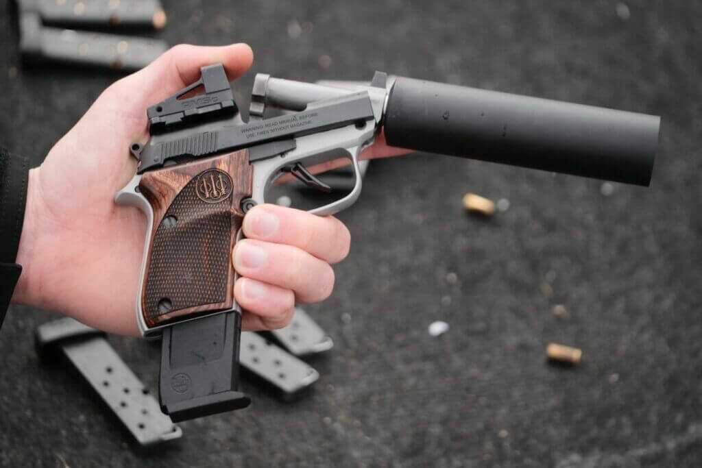 Barrel cracked open, allowing for loading a round into the chamber without racking the slide