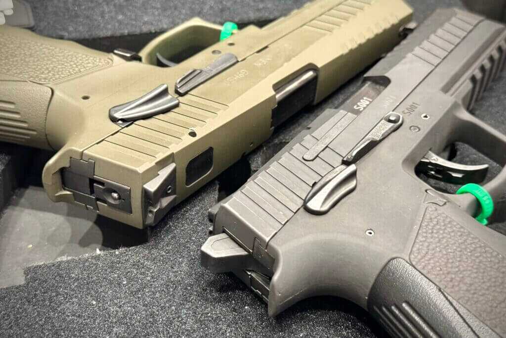 While two pistols are shown, they are the exact same except for the swappable firing mechanism