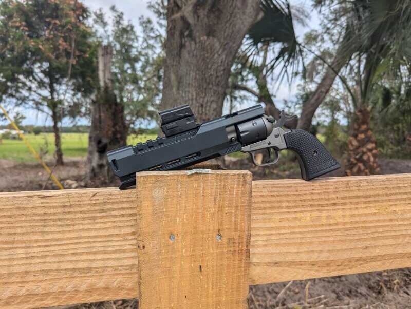 Space Cowboy revolver on fence post