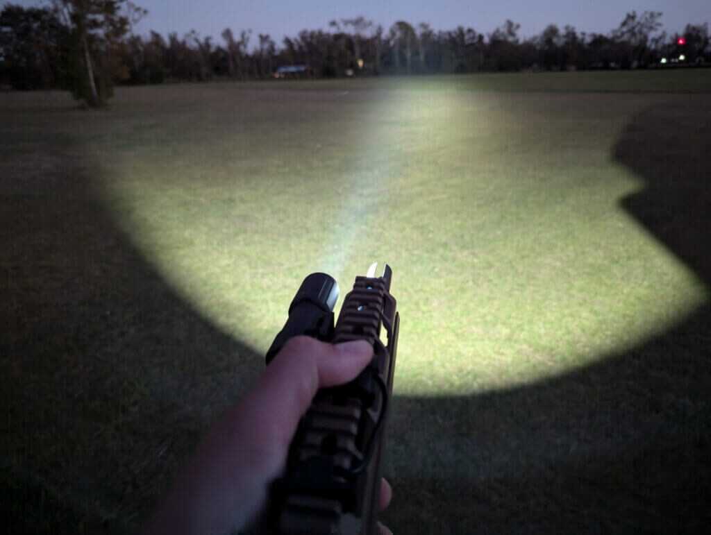 training with weapon light practicing activation and beam control