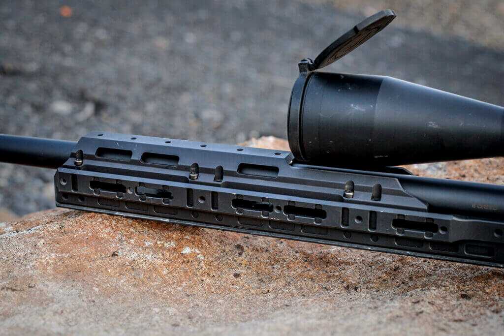 Kinetic Research Group C-4 Chassis Barrel shroud with extended optic inlet shoing clearance with Nightforce ATACR 7-35x56mm Riflescope