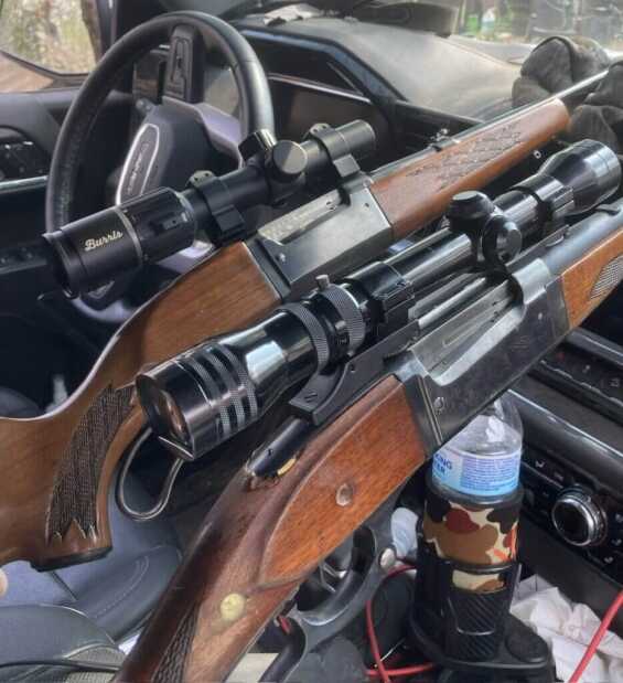 rifle in a car