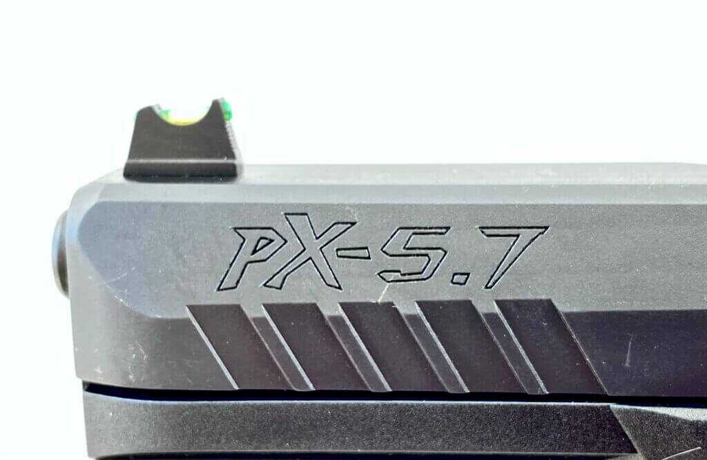 front iron sight and threaded barrel above engraving of PX-5.7 pistol