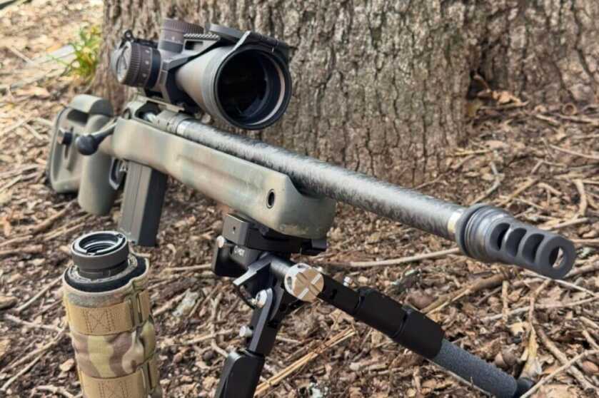 Savage 110 PPR on bark-strewn ground