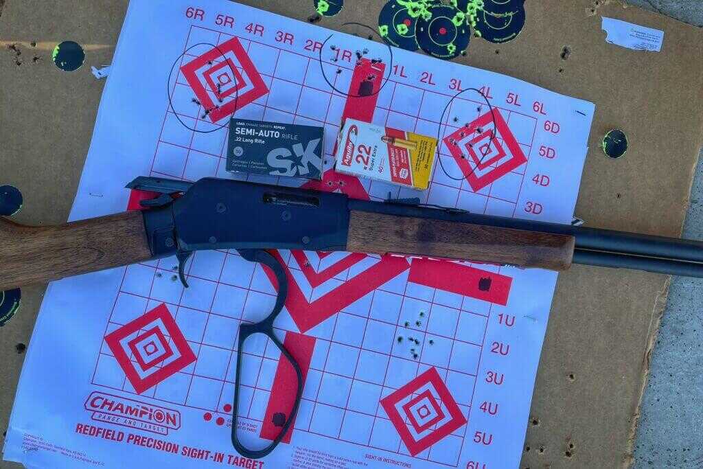 Savage Revel on paper target with two ammo boxes