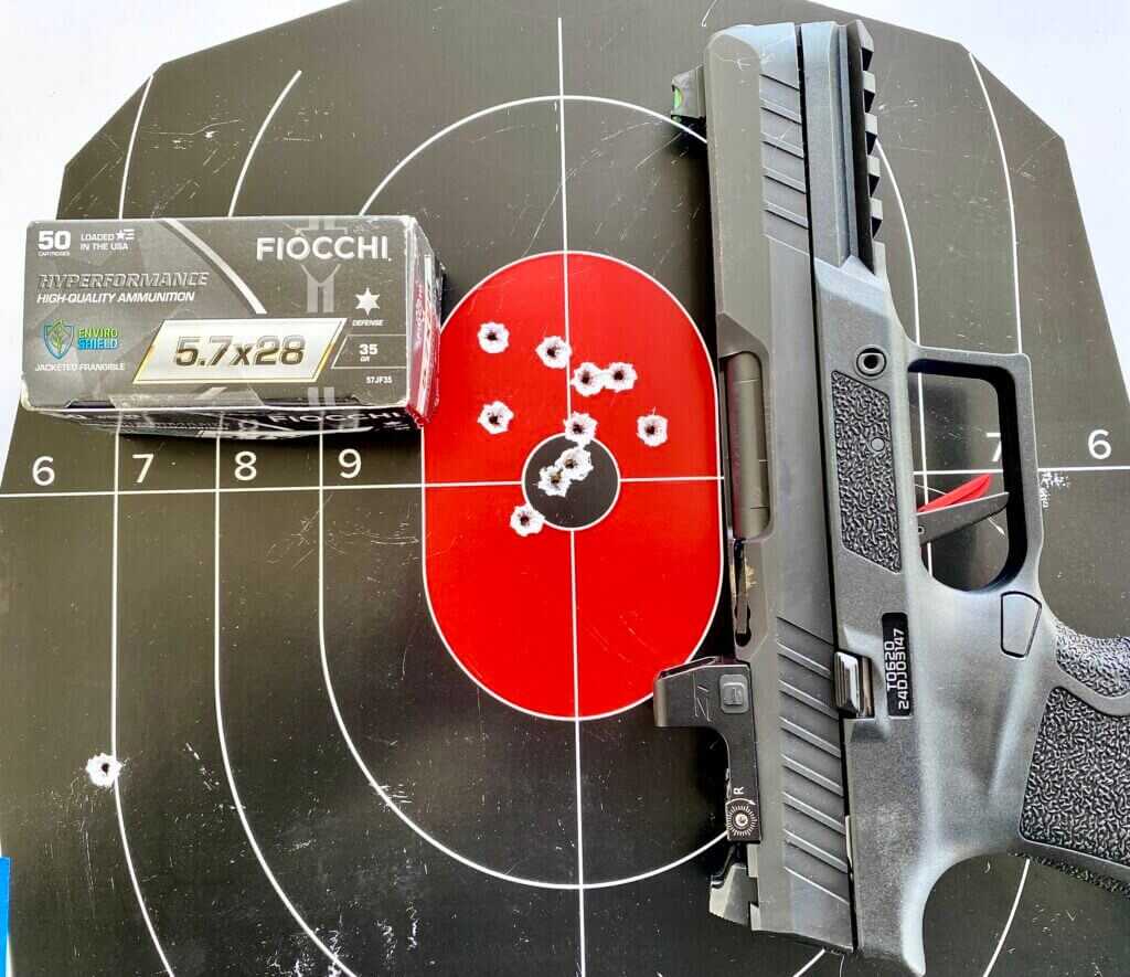 Fiocchi 5.7x28 ammo and pistol on target