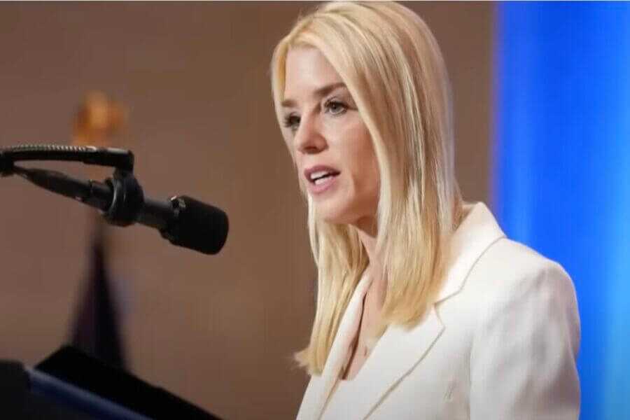 Pam Bondi at the podium.