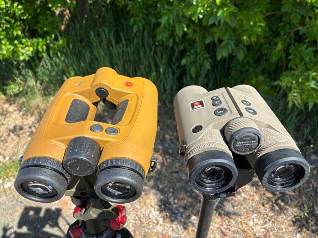two binoculars on stands