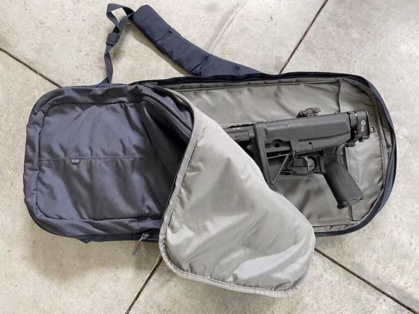 folded rifle in 5.11 discreet bag.